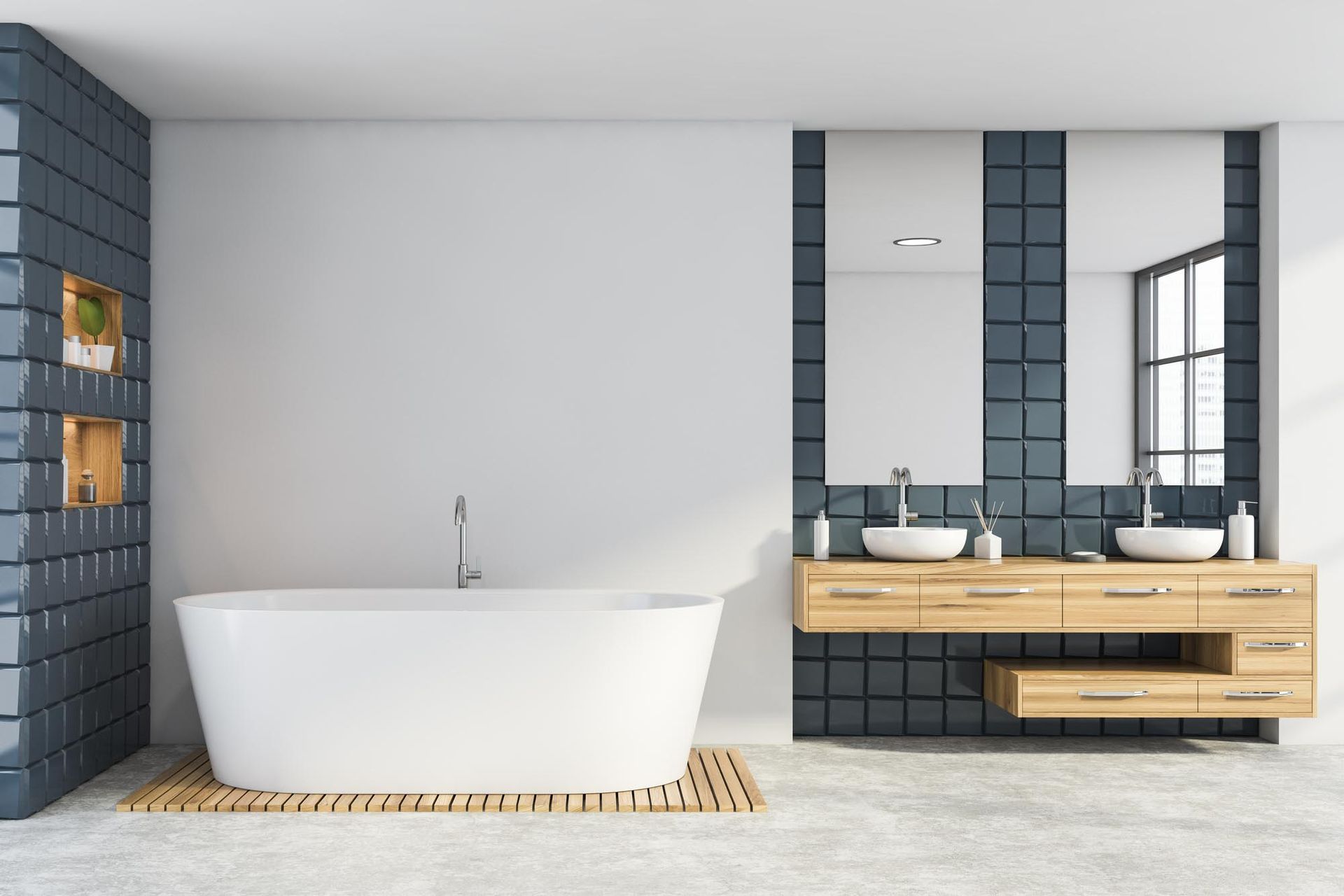 A bathroom with a bathtub and two sinks.