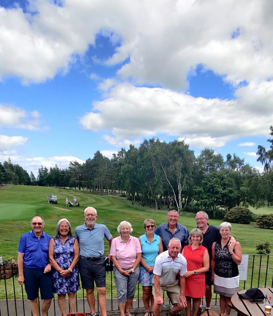 Players playing golf at the scottish golf course