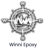 Winni Epoxy logo with compass rose and pine trees above the text &ldquo;Winni Epoxy&rdquo;