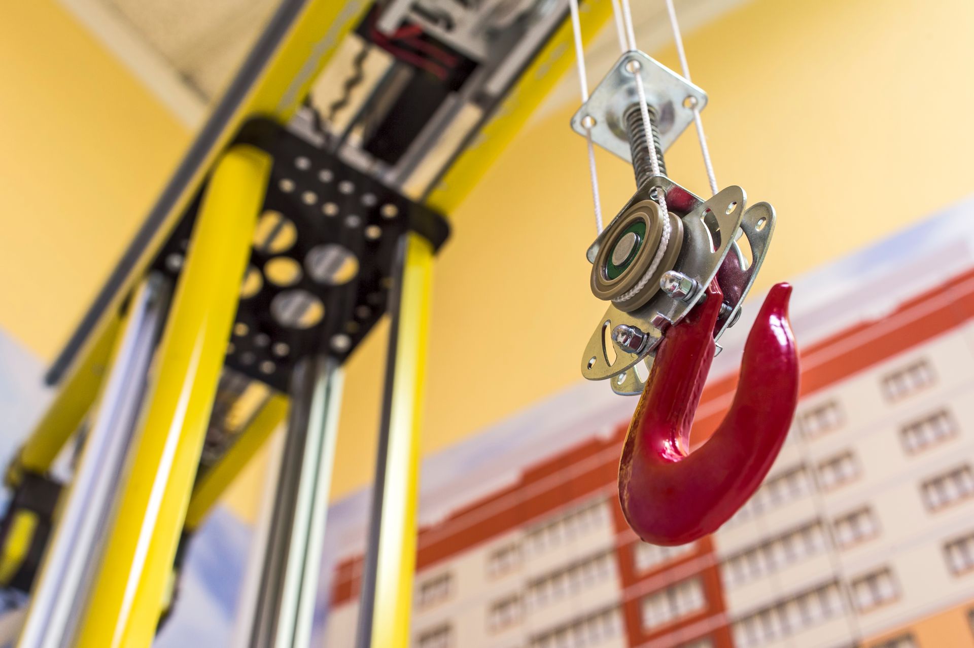 Local crane rental hook and pulley system for commercial construction lift. Local crane rental hook and pulley system for commercial construction lift.