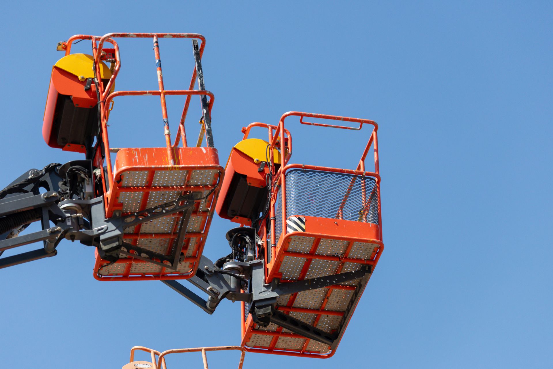 Crane leasing service with a mobile hydraulic truck crane lifting structural steel at a jobsite. Crane leasing service with a mobile hydraulic truck crane lifting structural steel at a jobsite.