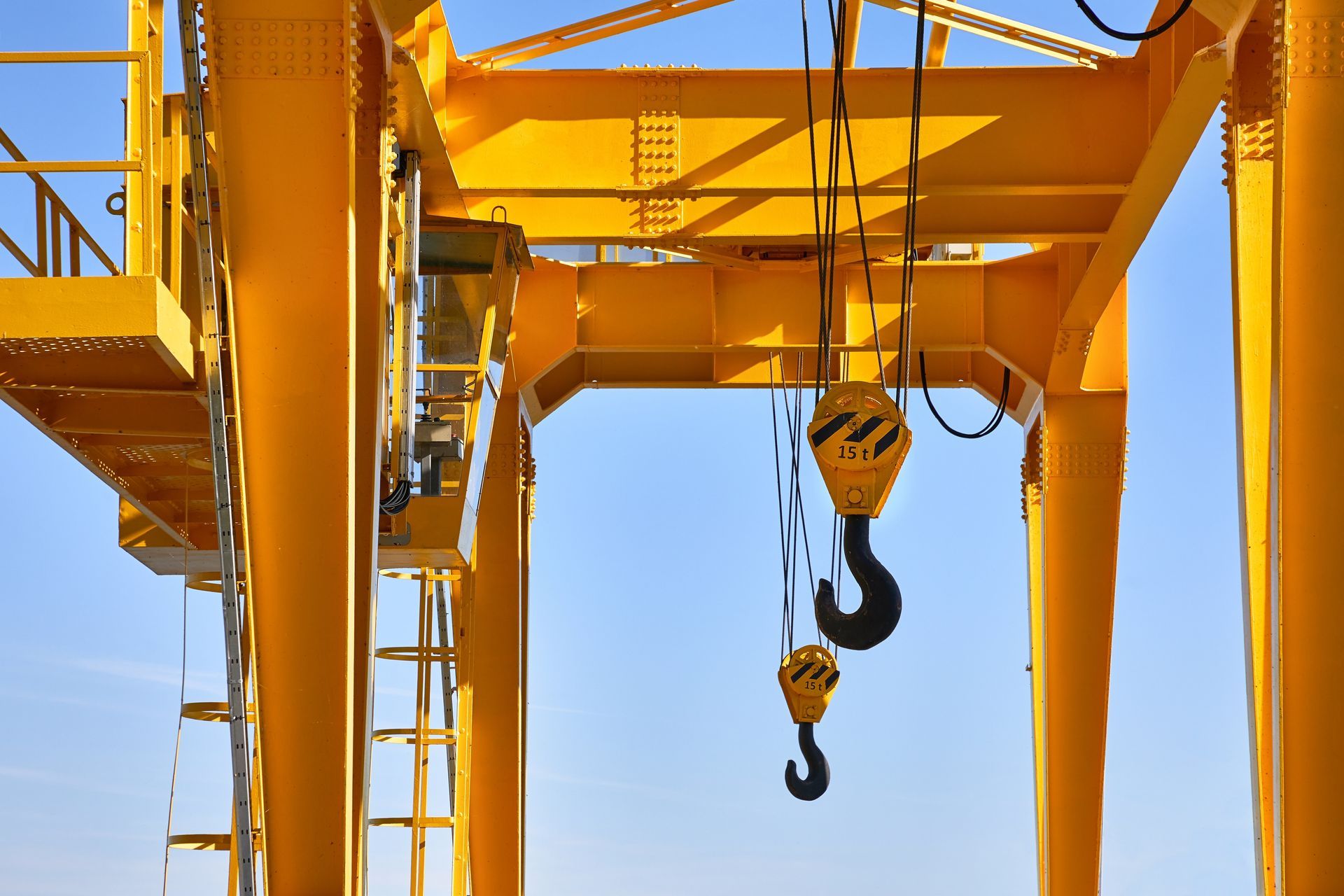 Truck crane rental with heavy-duty lifting hooks for industrial construction projects. Truck crane rental with heavy-duty lifting hooks for industrial construction projects.