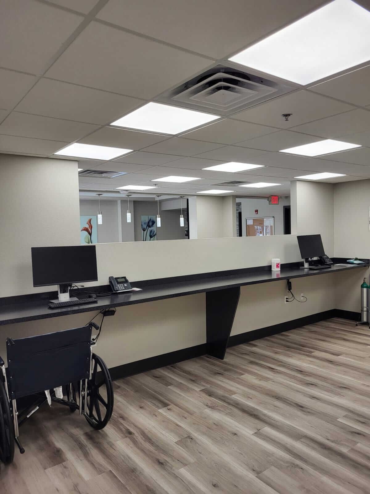 There is a wheelchair in the middle of the room.