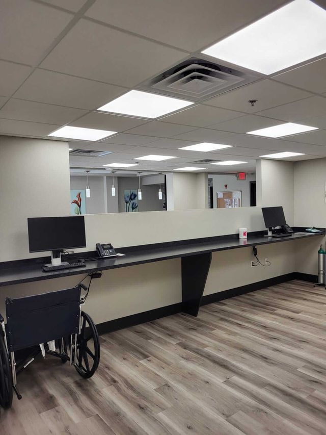 There is a wheelchair in the middle of the room.