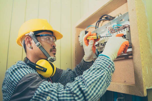 Electrician checking wires
