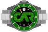 Un orologio da polso con lunetta verde e quadrante scuro caratterizzato da un grande logo