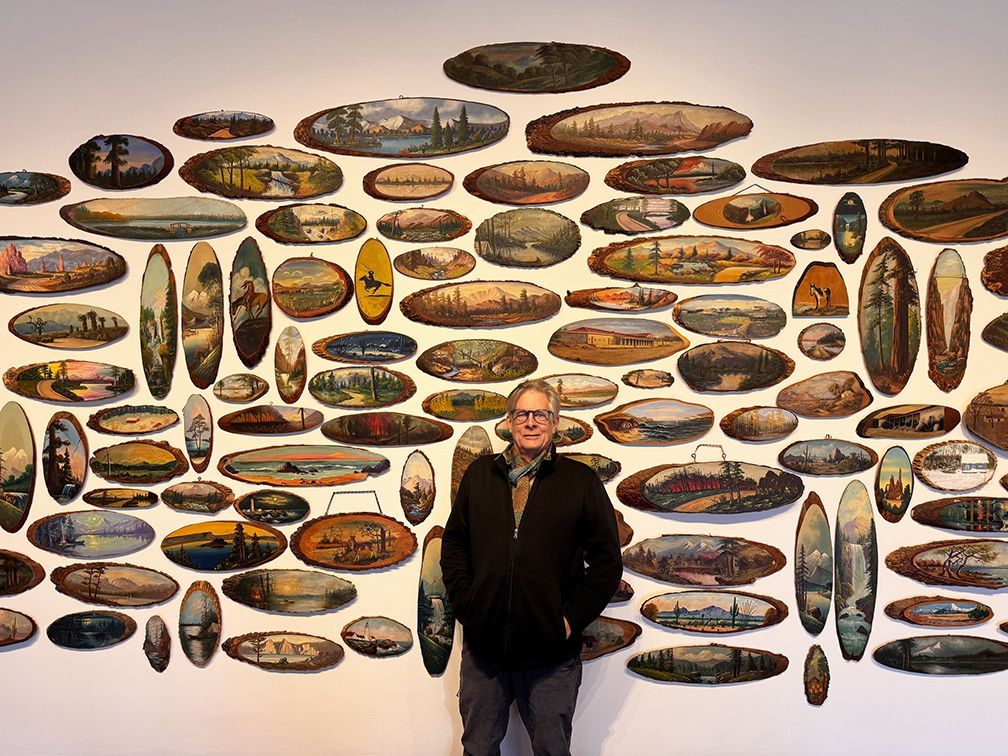 colorful souvenir landscape paintings on oval wood slices