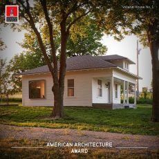 A small white house with a porch and trees in front of it.
