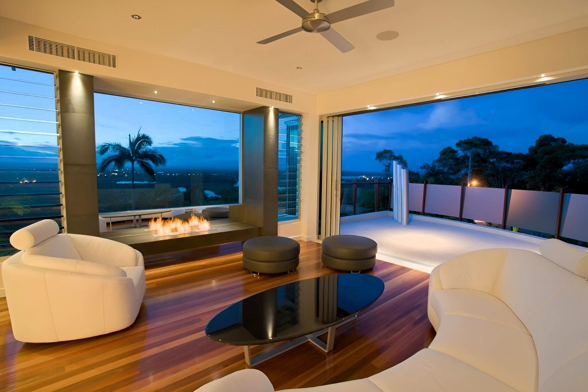 A Open Plan Living Area with Fire Place — Grainger Windows & Doors in Ballina, NSW