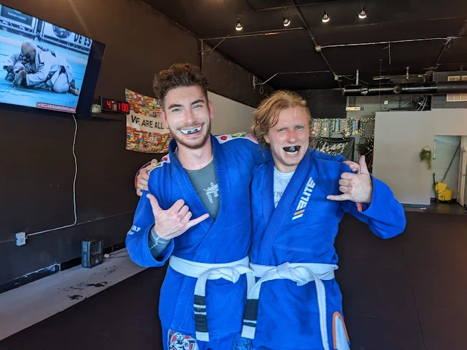 Beginner students drilling Jiu-Jitsu escapes at Speakeasy Jiu-Jitsu & Wrestling Academy in Asheville, NC for confidence.