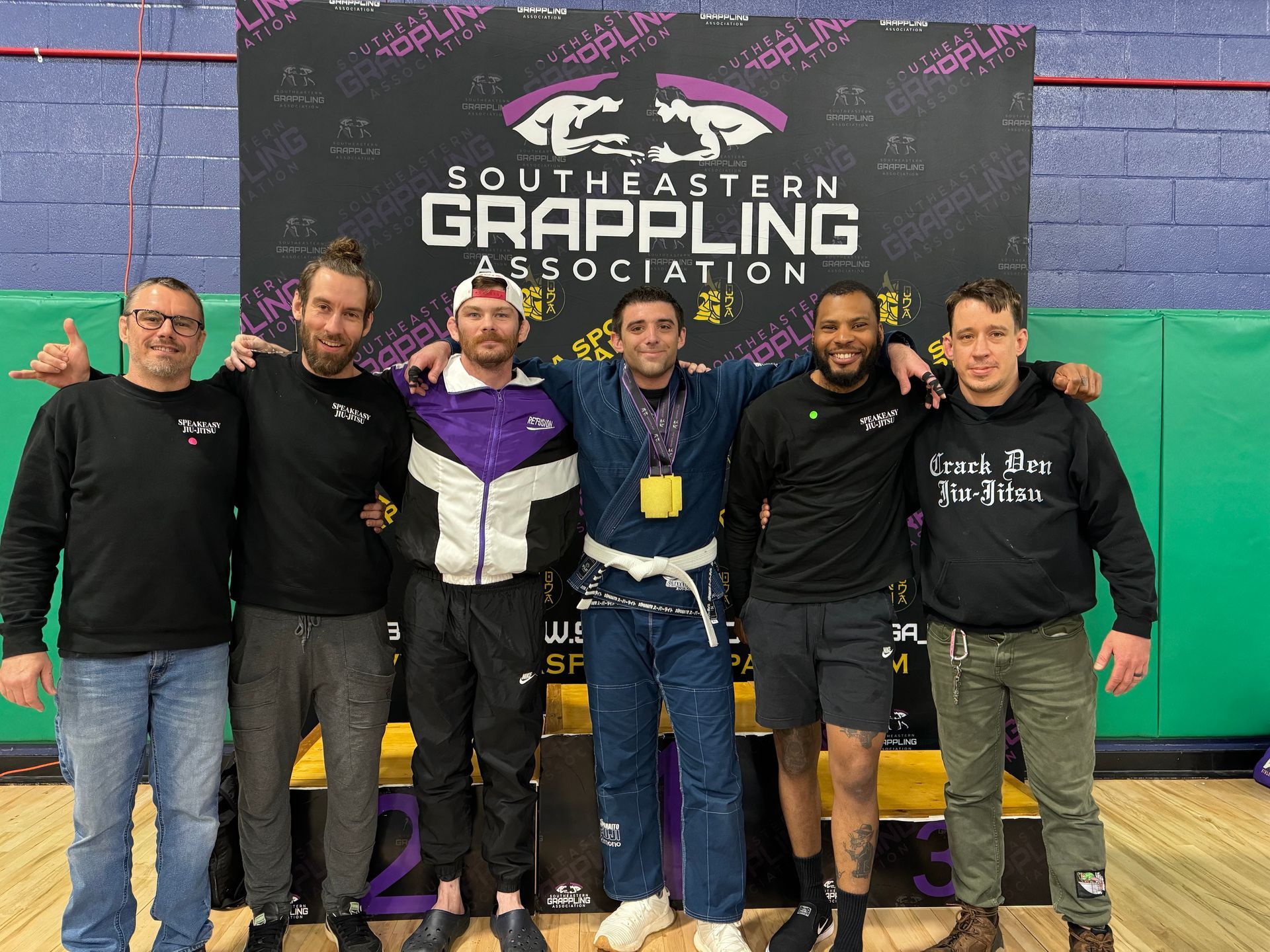 Beginners drilling Jiu-Jitsu techniques at Speakeasy Jiu-Jitsu & Wrestling Academy in Asheville, NC for confidence.