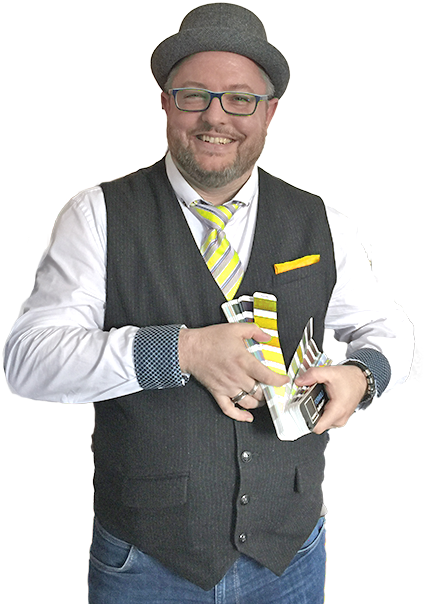 Lars Briesemeister, ein Mann mit Hut und Krawatte