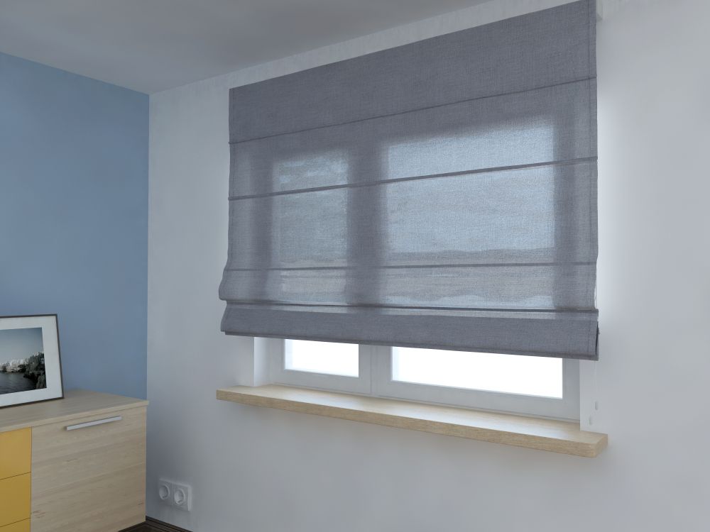 Gray Roman Shade Over a Window in A Room with A Light Blue Wall — BlindDESIGN in Byron Bay, NSW