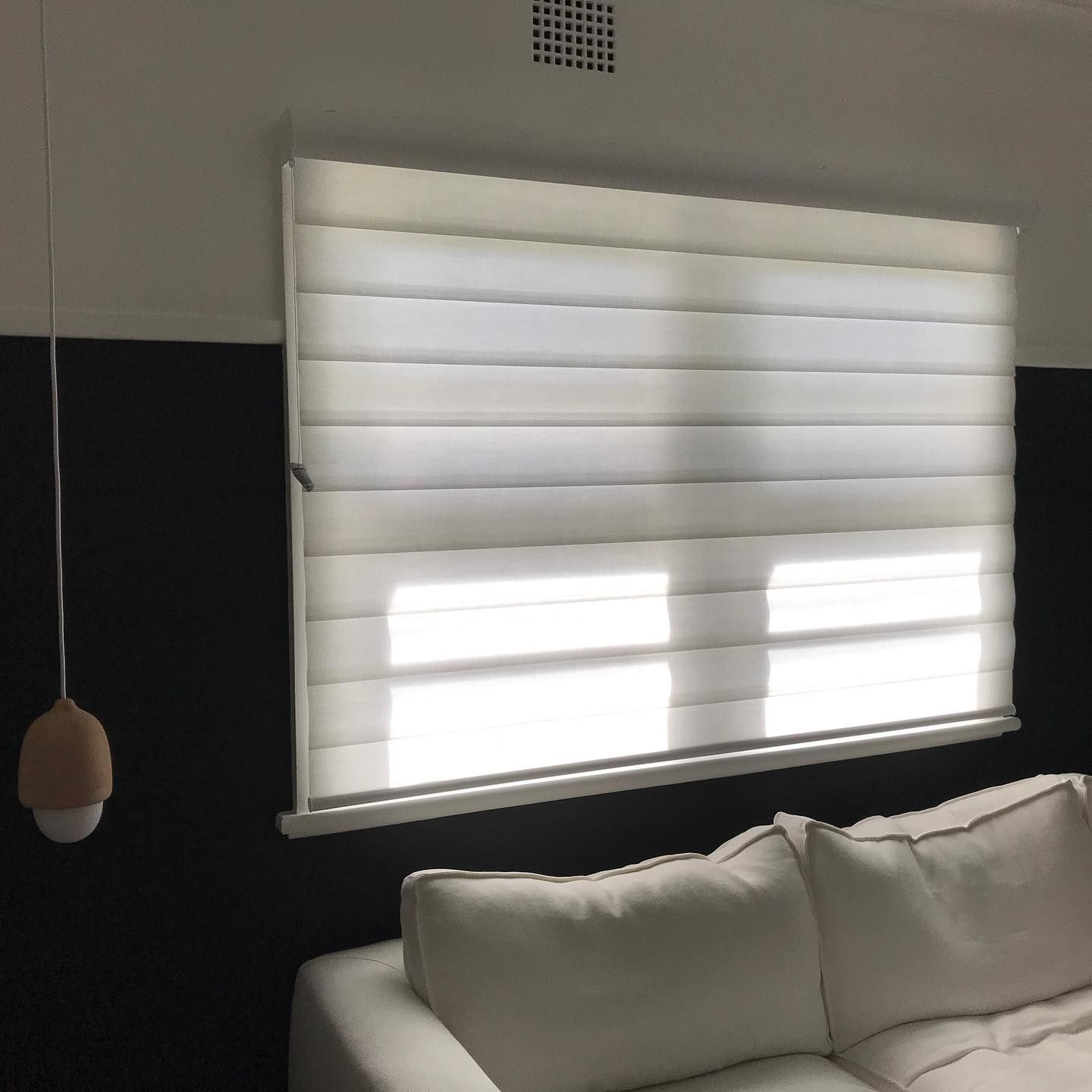 A White Roman Shade Over a Window — BlindDESIGN in Byron Bay, NSW