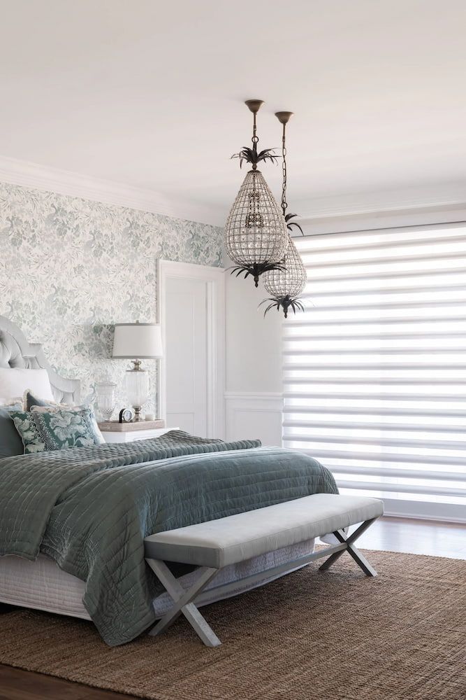 Bedroom With Patterned Wallpaper, Bed, Bench, and Chandelier — BlindDESIGN in Ballina, NSW
