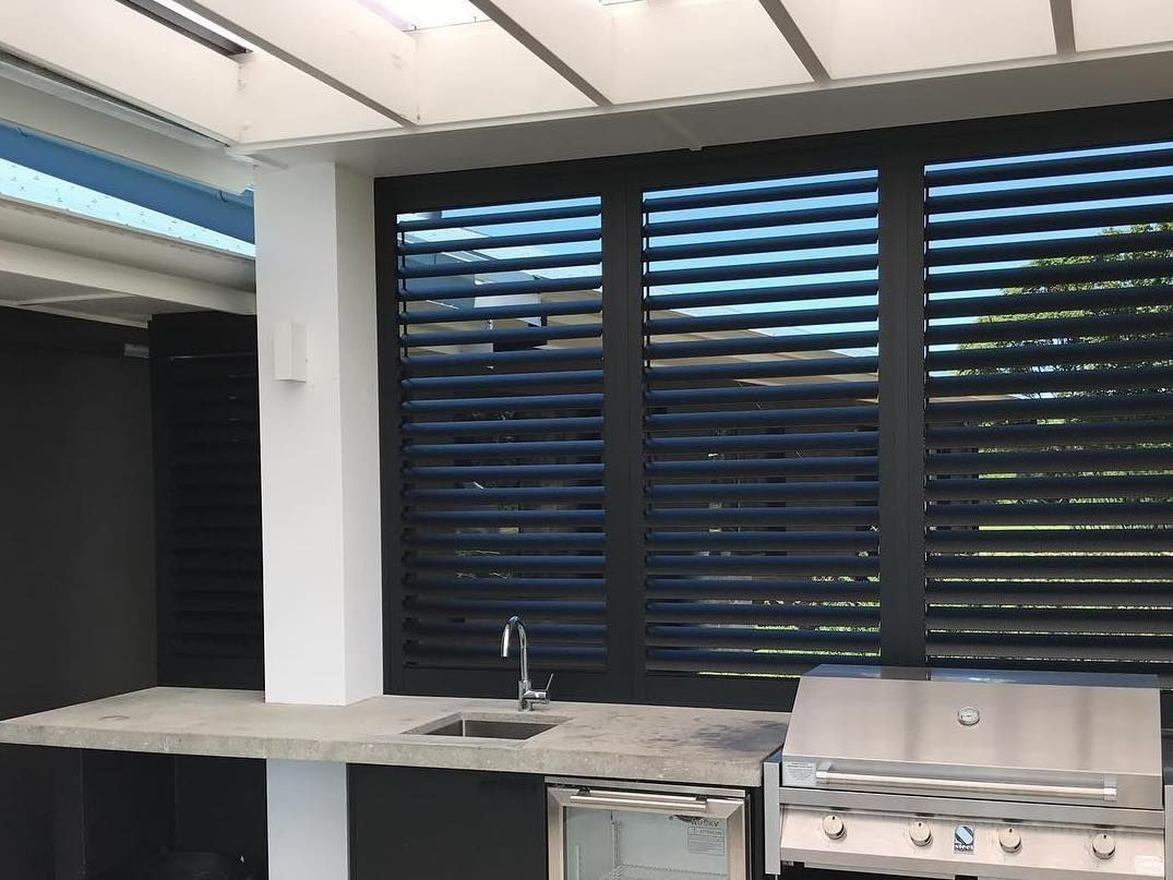 Outdoor Kitchen with Black Shutters — BlindDESIGN in Lismore, NSW