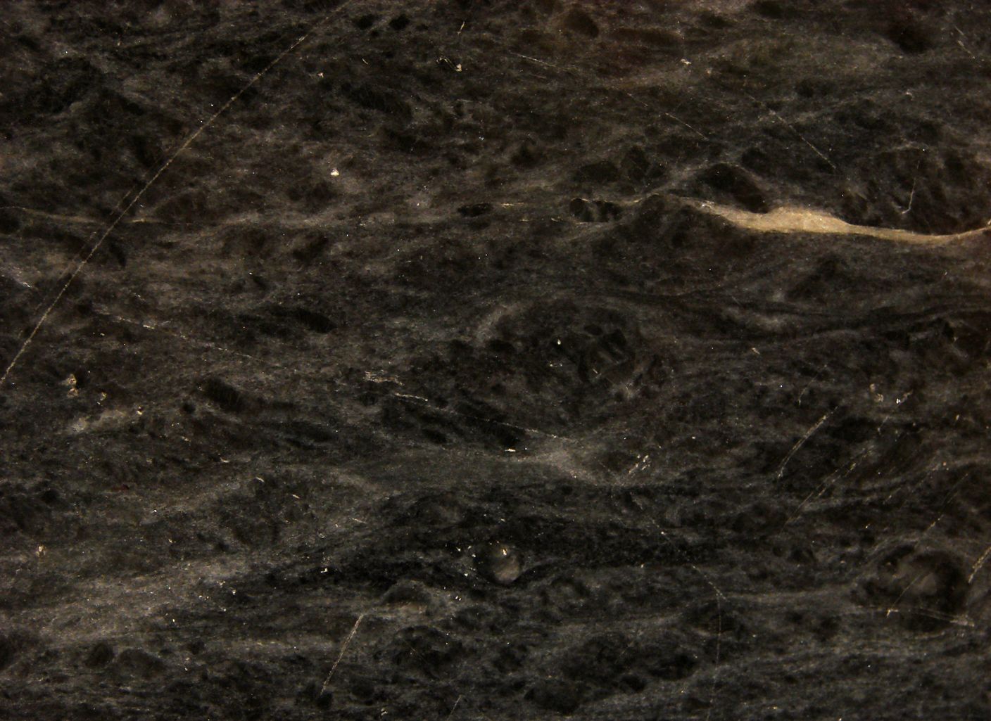 Un primer plano de una textura de mármol negro.