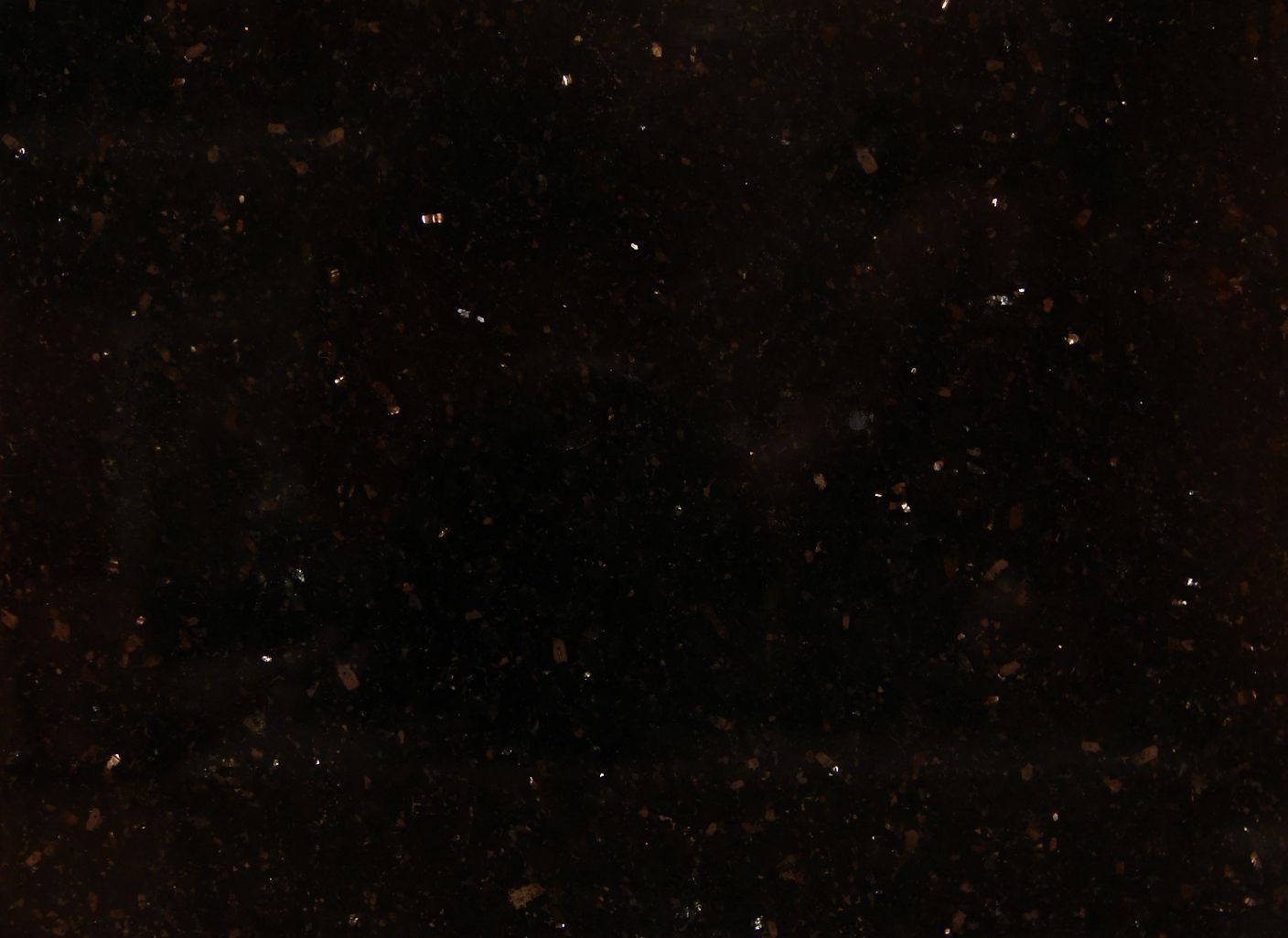 Un primer plano de un fondo negro con muchas estrellas.