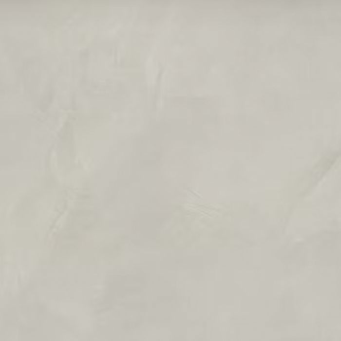 Un primer plano de un azulejo blanco con textura de mármol.