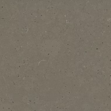 Un primer plano de un azulejo gris con textura granulada.