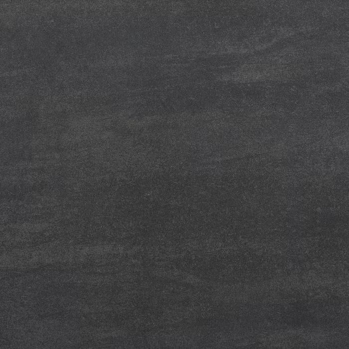 Un primer plano de un mosaico negro que parece una pizarra.