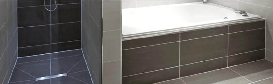 Un cuarto de baño con ducha y bañera.