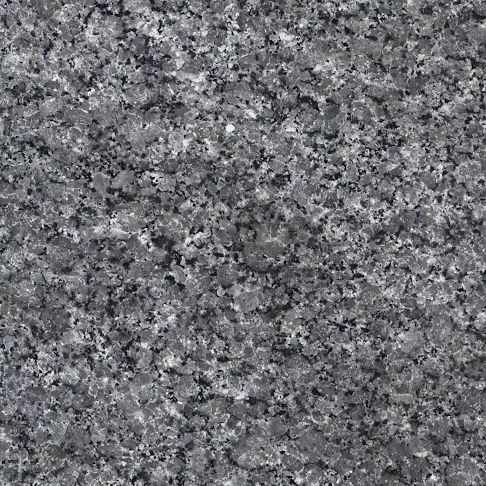 Un primer plano de una encimera de granito gris.