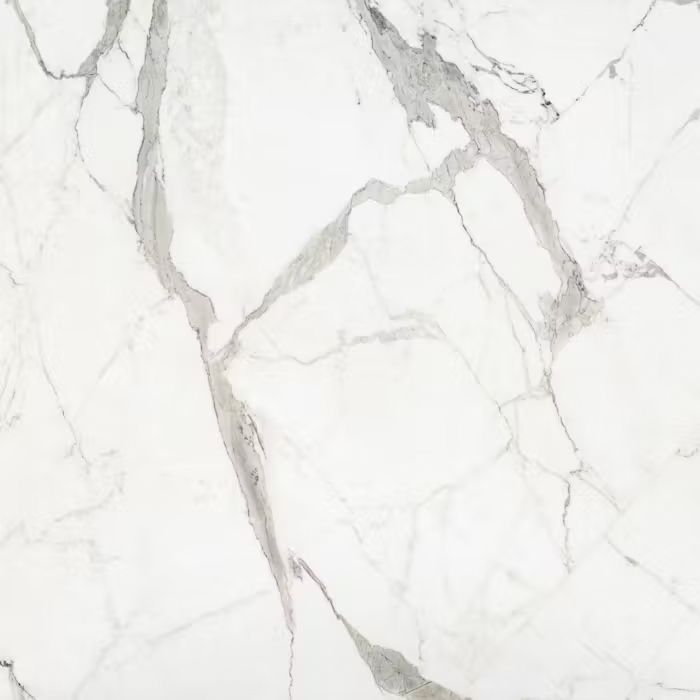 Un primer plano de una encimera de mármol blanco