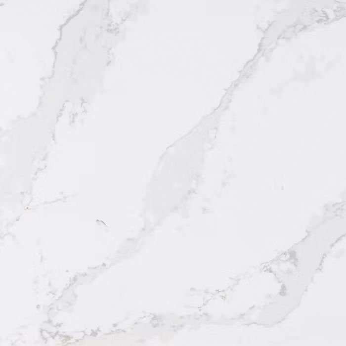 Un primer plano de una encimera de mármol blanco.