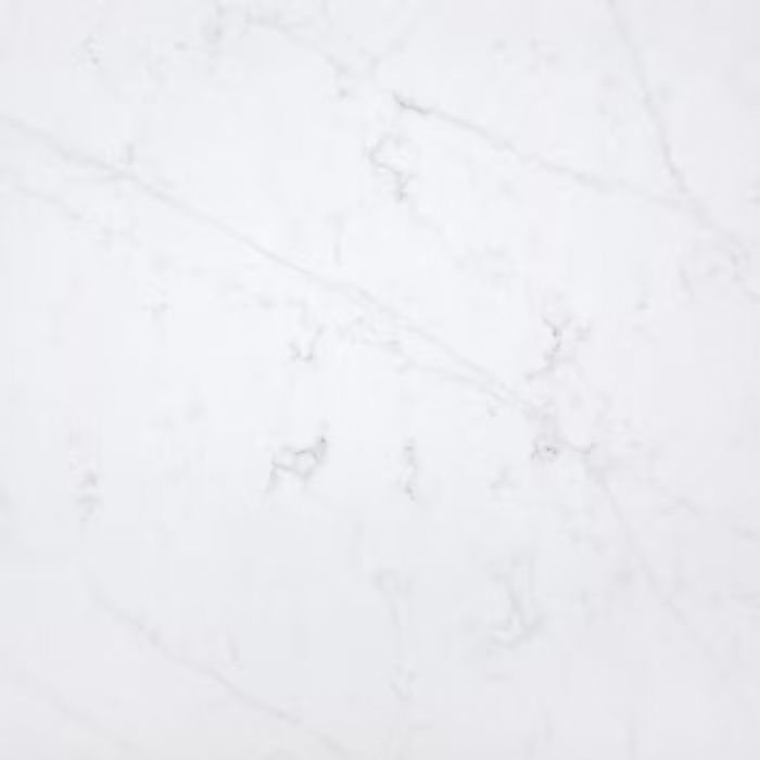 Un primer plano de una encimera de mármol blanco.