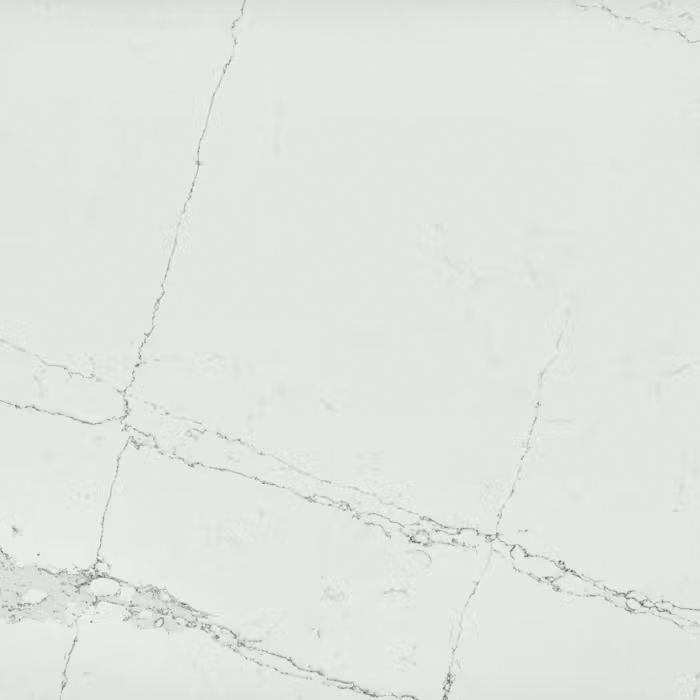 Un primer plano de una encimera de mármol blanco.