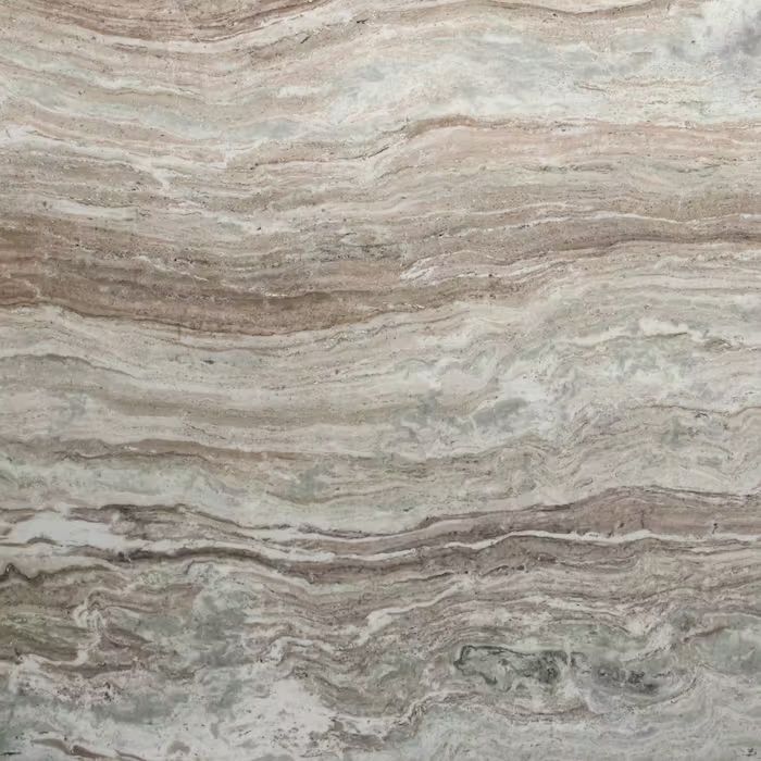 Un primer plano de una encimera de mármol con un patrón de remolino.