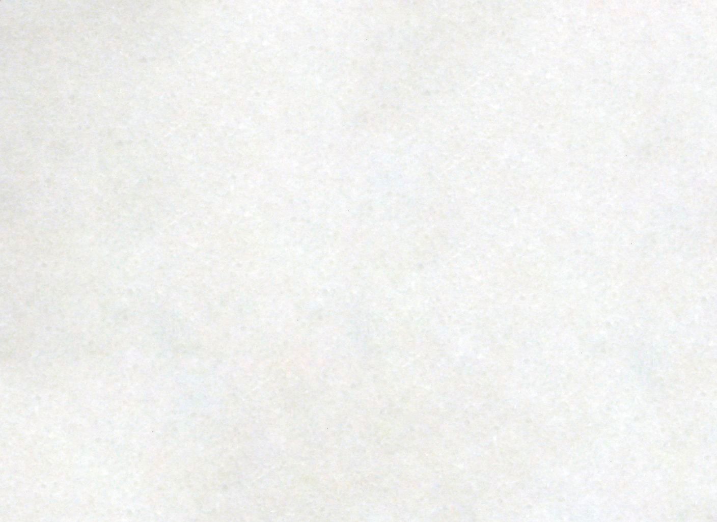 Un primer plano de una hoja de papel blanco.