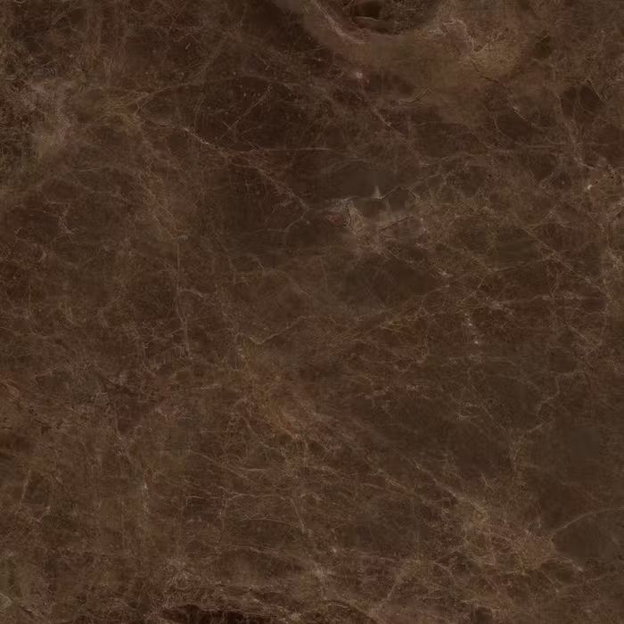 Un primer plano de una baldosa de mármol marrón.