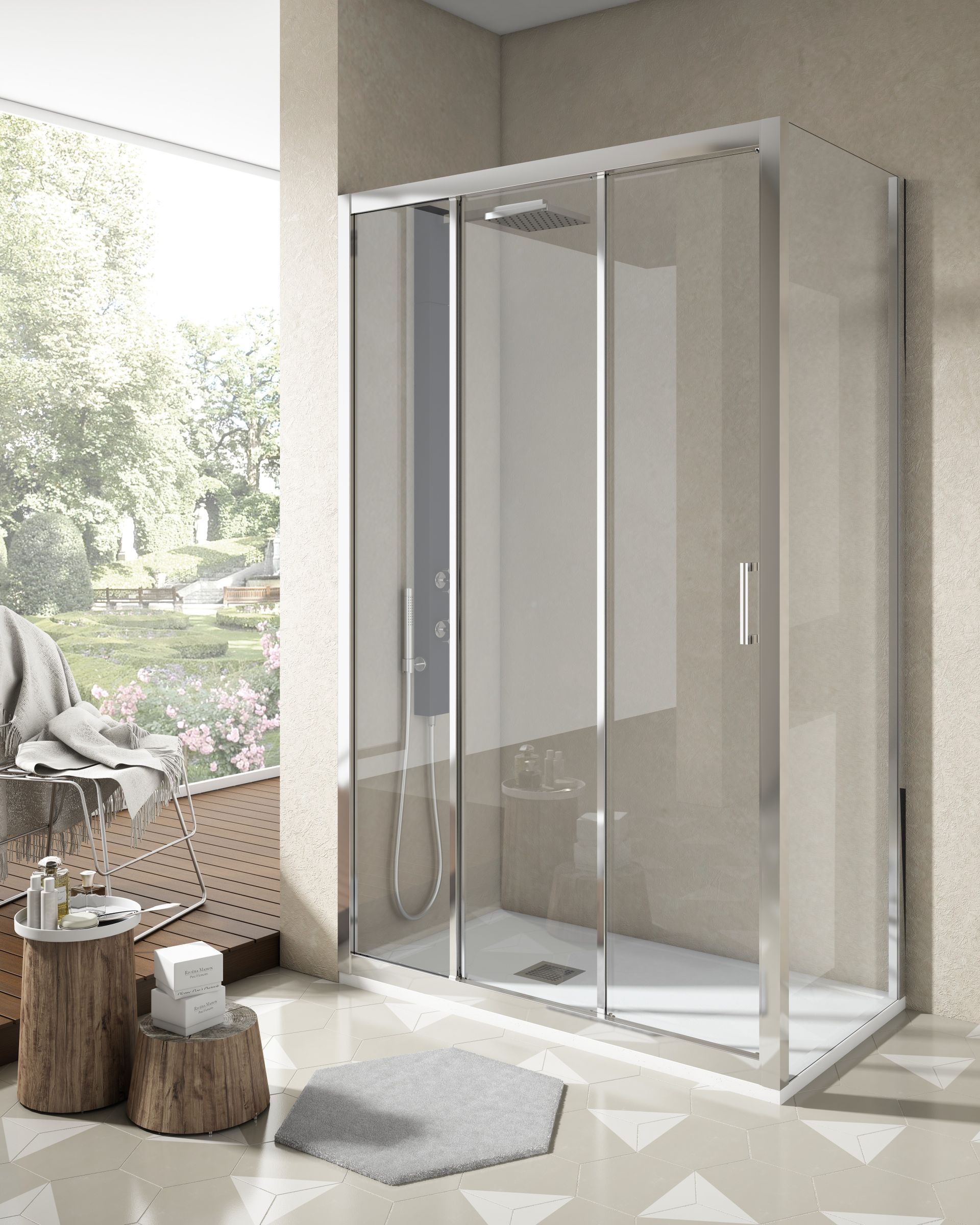 Un baño con mampara de ducha corredera de cristal