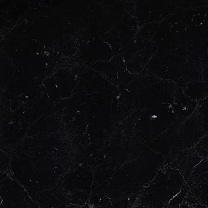 Un primer plano de una encimera de mármol negro.