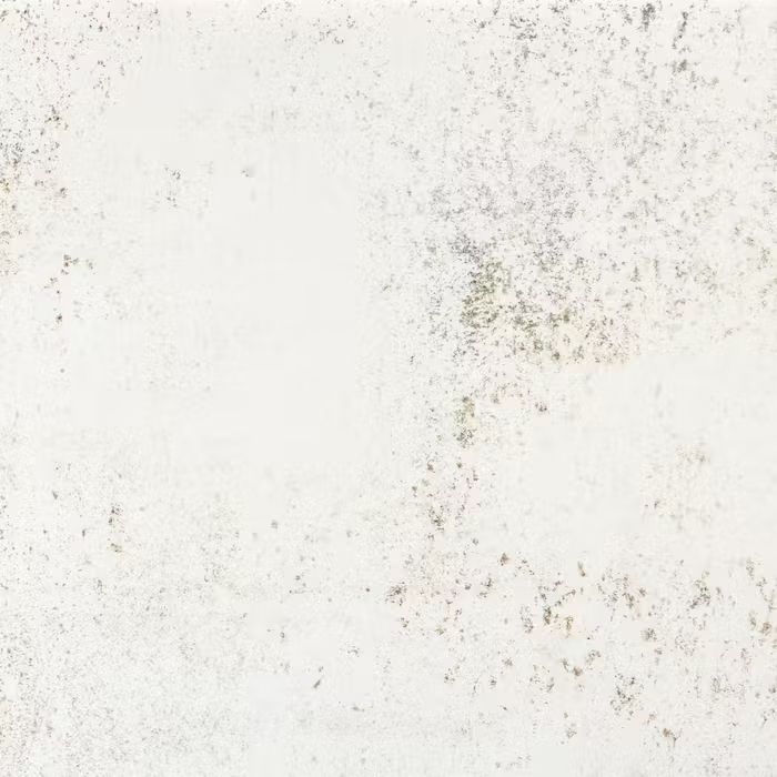 Un primer plano de una encimera de granito blanco.