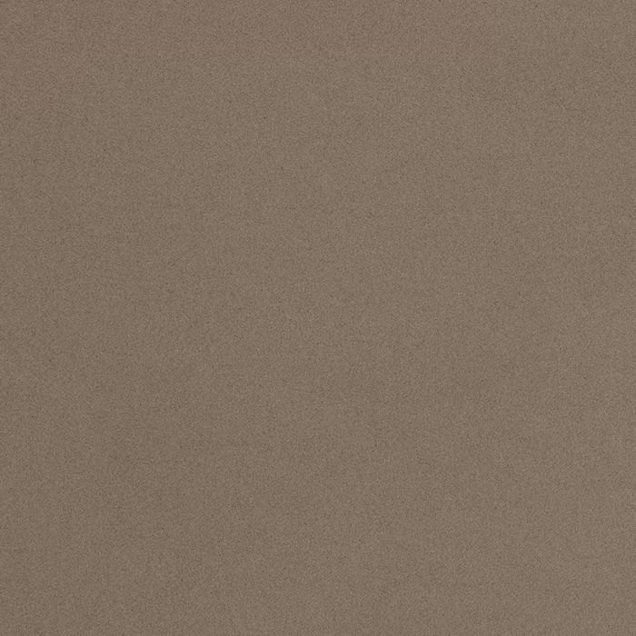 Un primer plano de una textura de papel marrón.