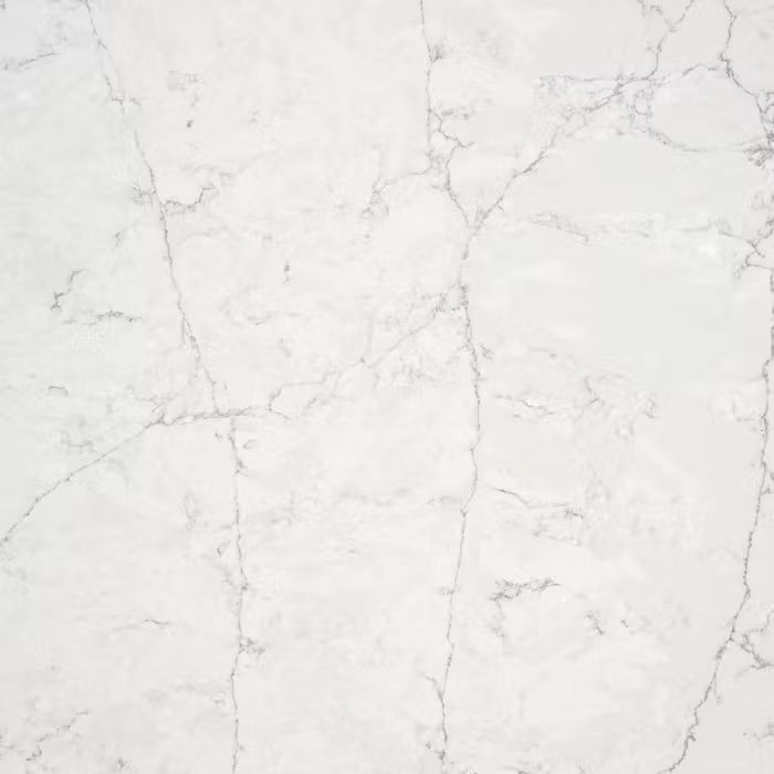 Un primer plano de una encimera de mármol blanco.