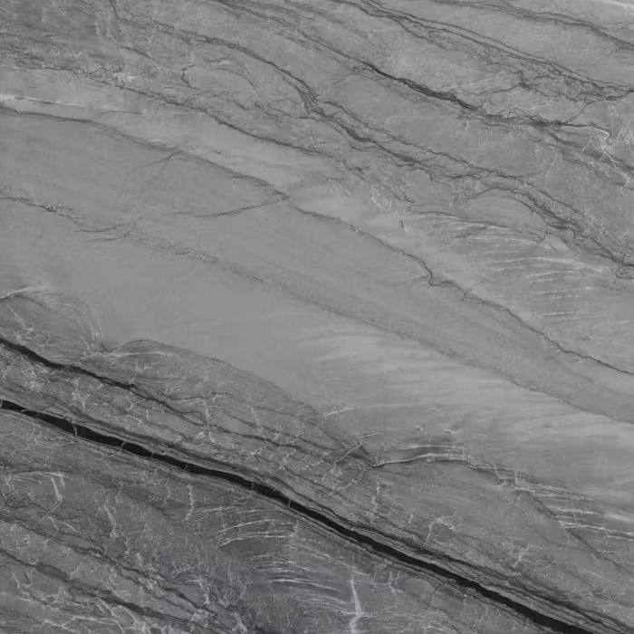 Un primer plano de una baldosa de mármol gris.