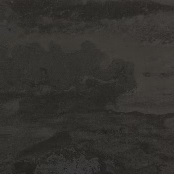 Un primer plano de un azulejo negro que parece un cuadro.