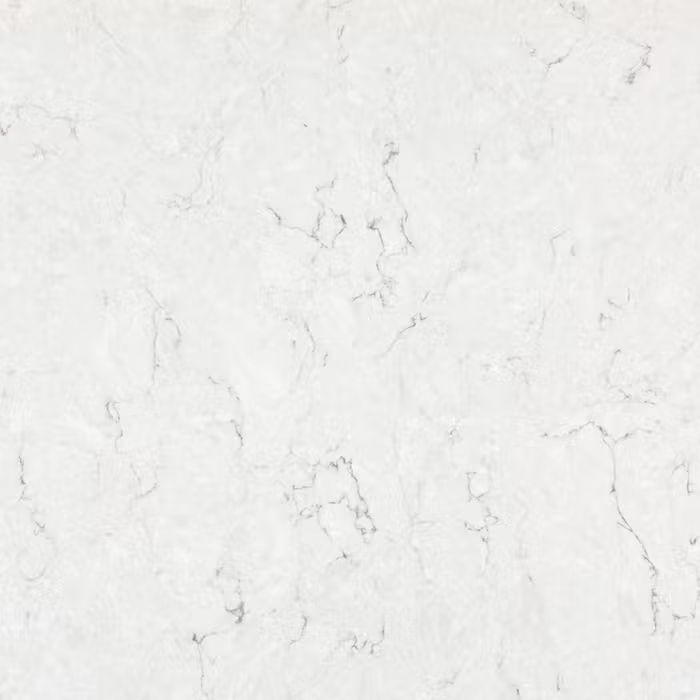 Un primer plano de una encimera de mármol blanco.