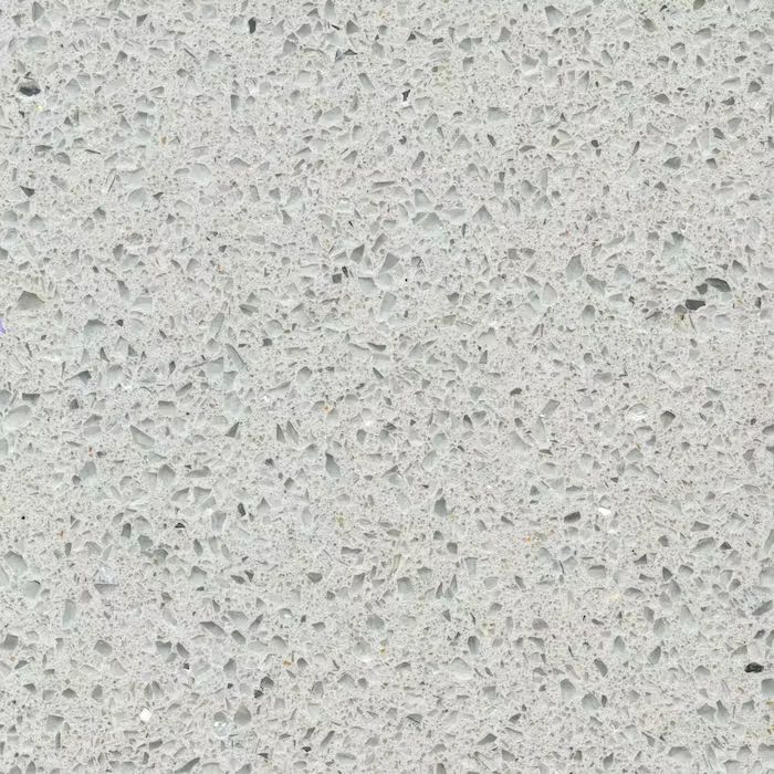 Un primer plano de una encimera de granito blanco.