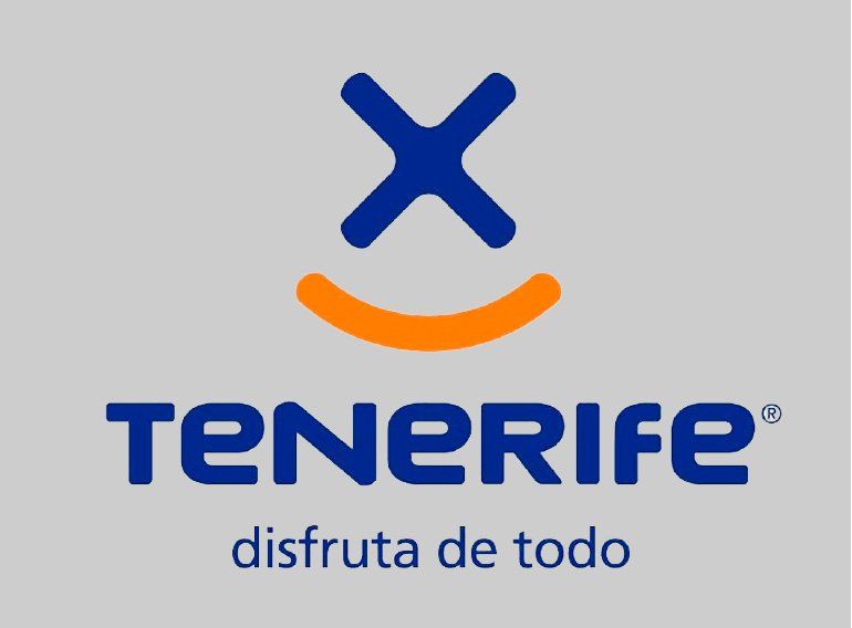 Un logo azul y naranja para tenerife con una cara sonriente.