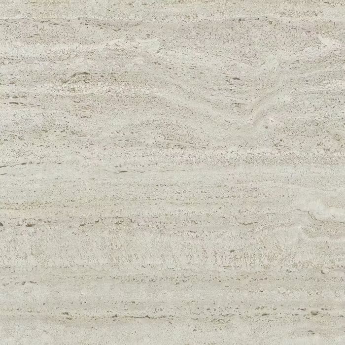 Un primer plano de un azulejo blanco con textura de mármol.