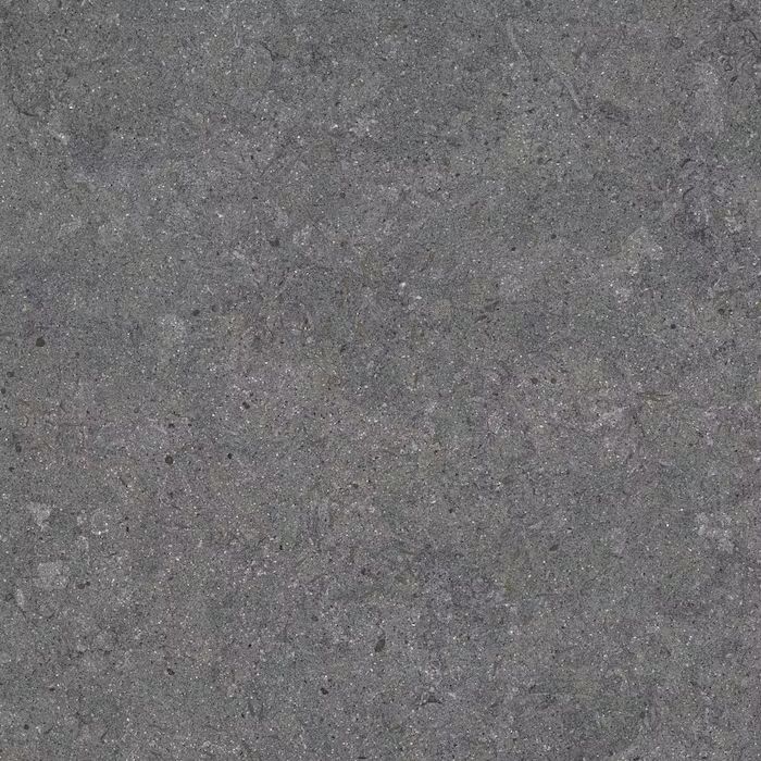 Un primer plano de un azulejo gris con textura granulada.