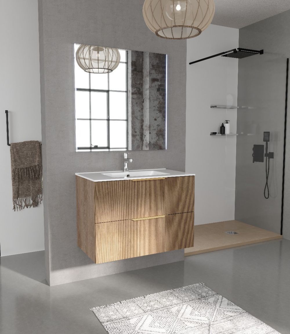 Un baño con lavabo y espejo.