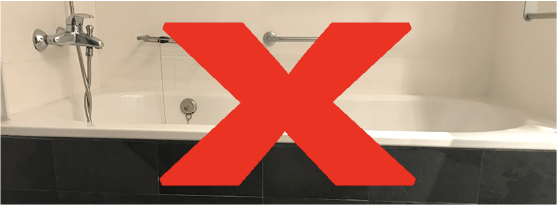 Una bañera con una x roja delante.