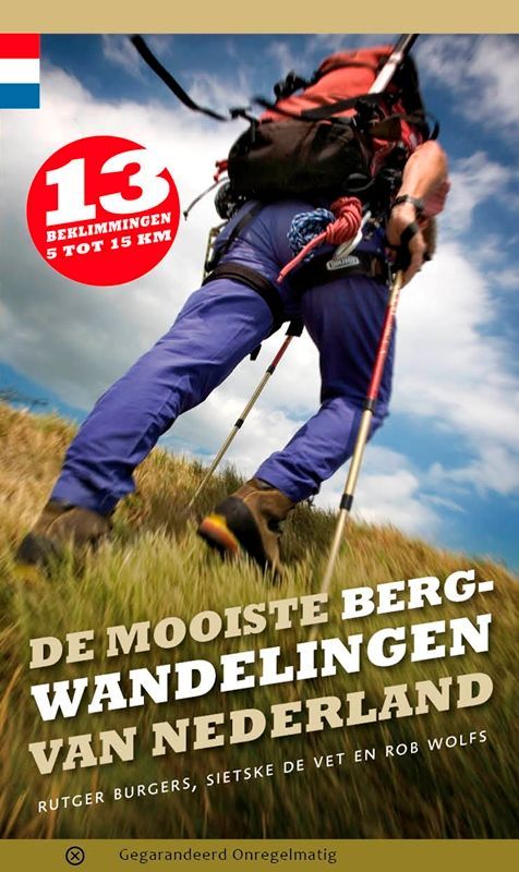 Book cover: Hiker on a hill, text "De Mooiste Bergwandelingen Van Nederland". Dutch flag, number 13, and author names.