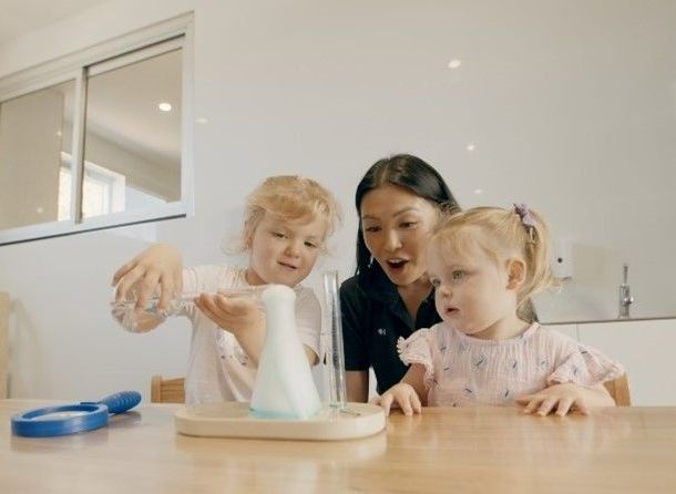 Toddlers Experimenting with Teacher — Shell Heights, NSW — Junior Einsteins Toddlers Experementing with Teacher — Shell Heights, NSW — Junior Einsteins